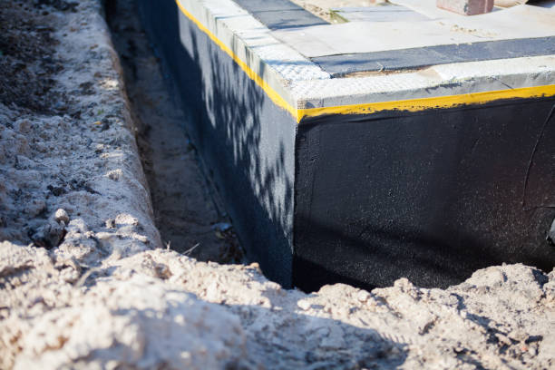 Professional Waterproofing technician working in North Adams, MI